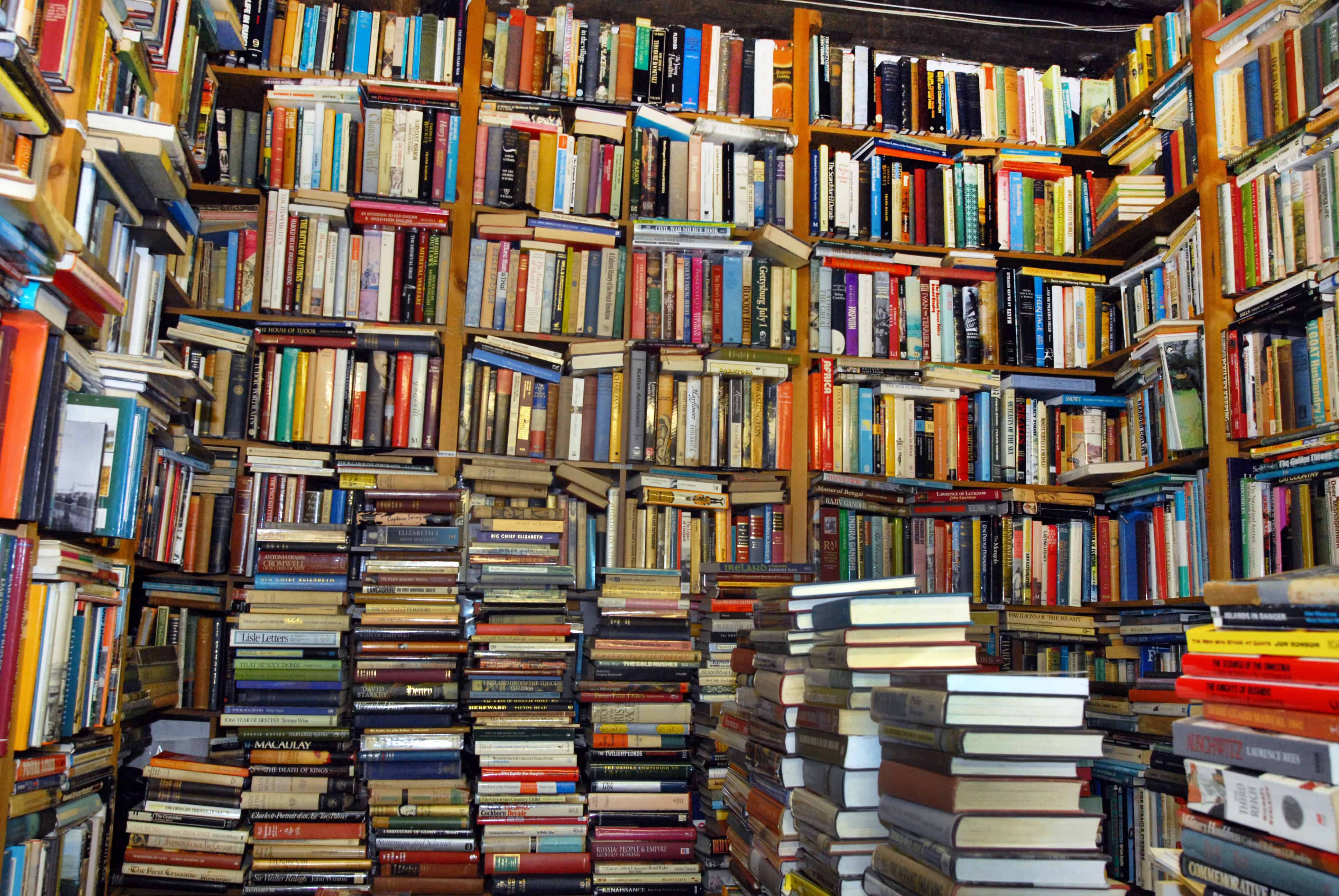 Image result for piles of books